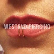 Dolphin Bites Piercing